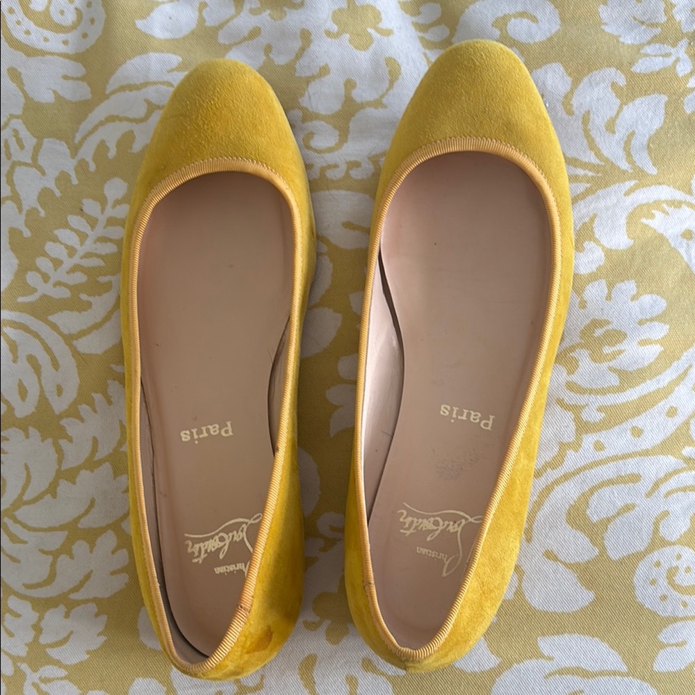 Christian Louboutin Yellow Flats Sleek Design